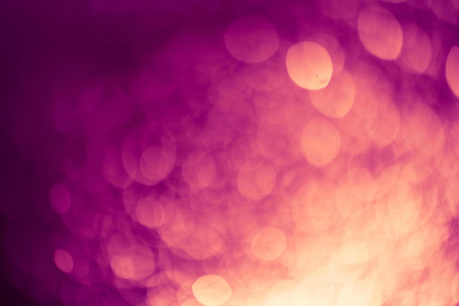 Dark purple Festive Christmas Beautiful abstract Background with bokeh lights. Holiday Texture with copy space. Can be used as Wallpaper, filling for a website, defocused photo