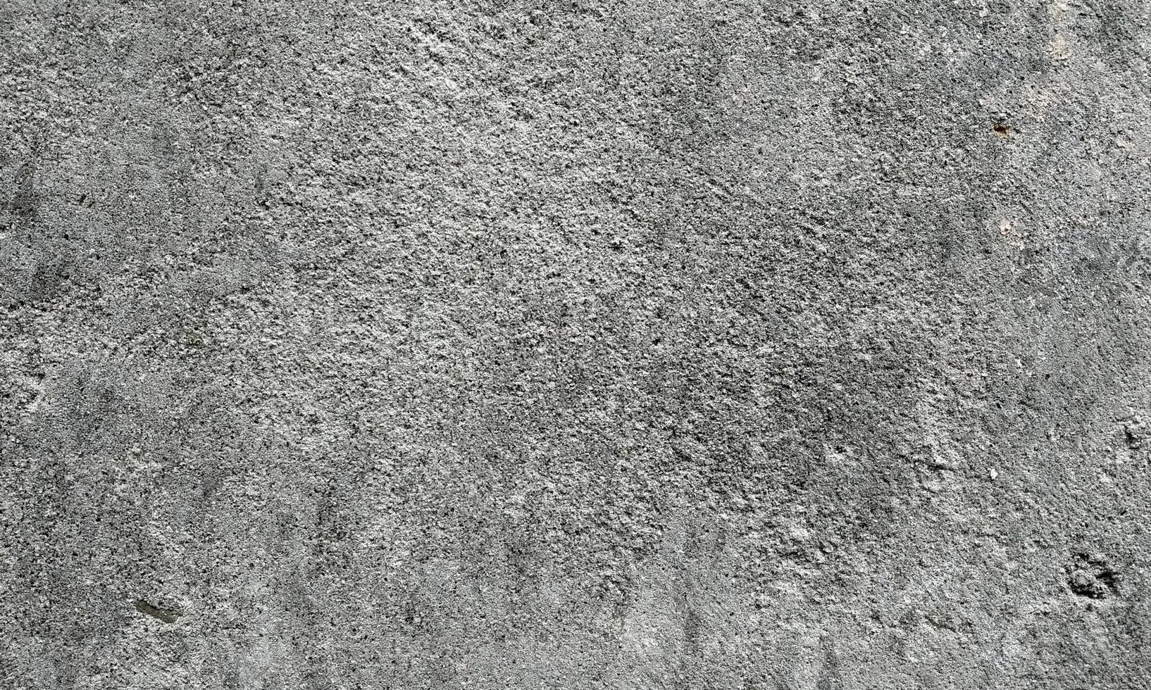 Texture of old concrete wall.Concrete wall of light grey color cement texture background.Grey pastel rough crack cement texture stone concrete,rock plastered stucco wall painted flat fade background. photo