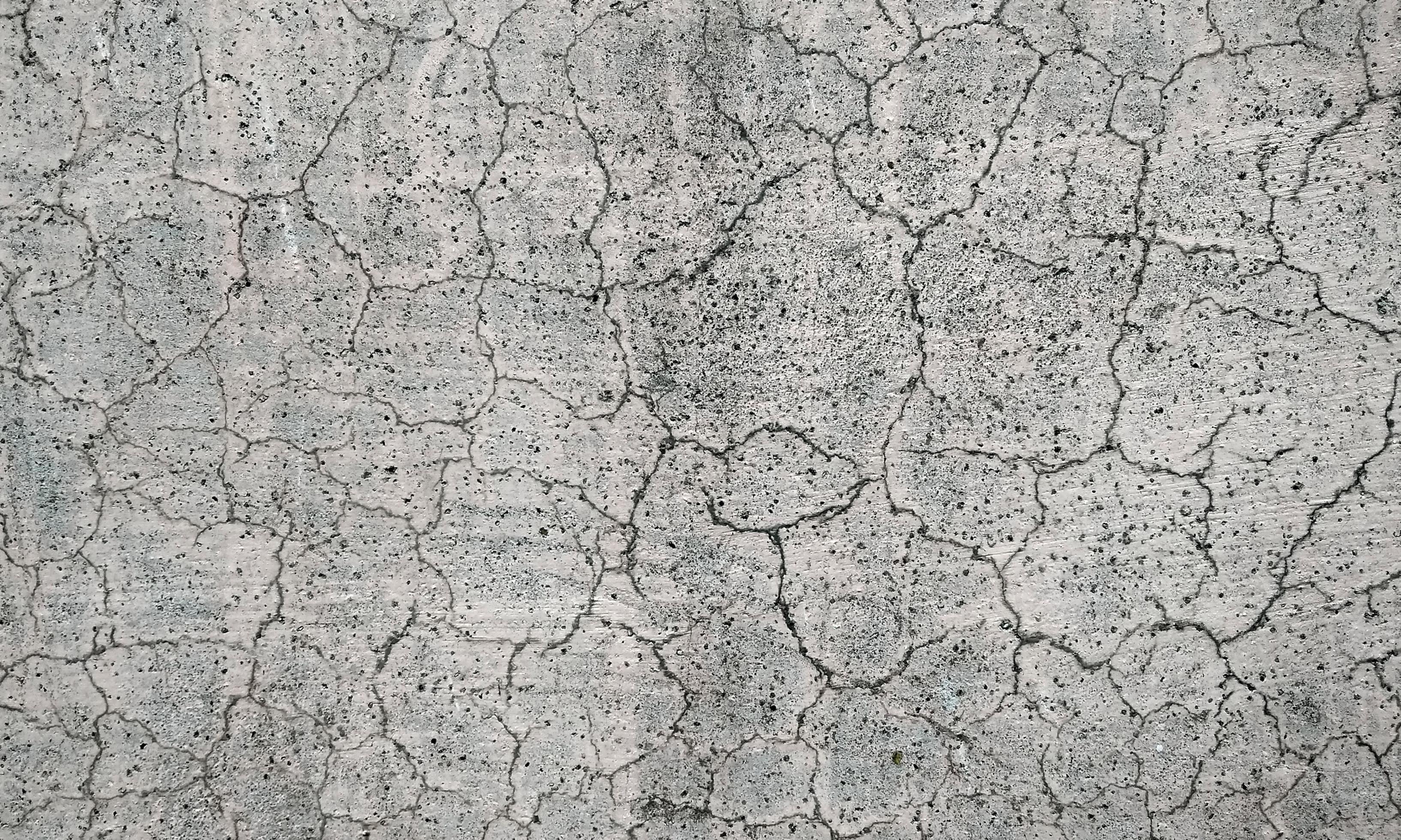 Texture of old concrete wall.Concrete wall of light grey color cement