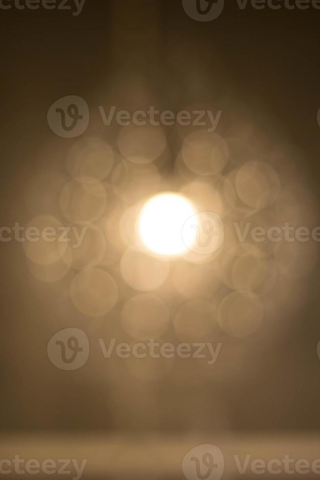 Texture, pattern, background. light crystal chandelier with blurred focus photo