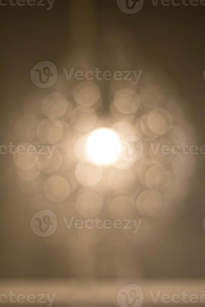 Texture, pattern, background. light crystal chandelier with blurred focus photo