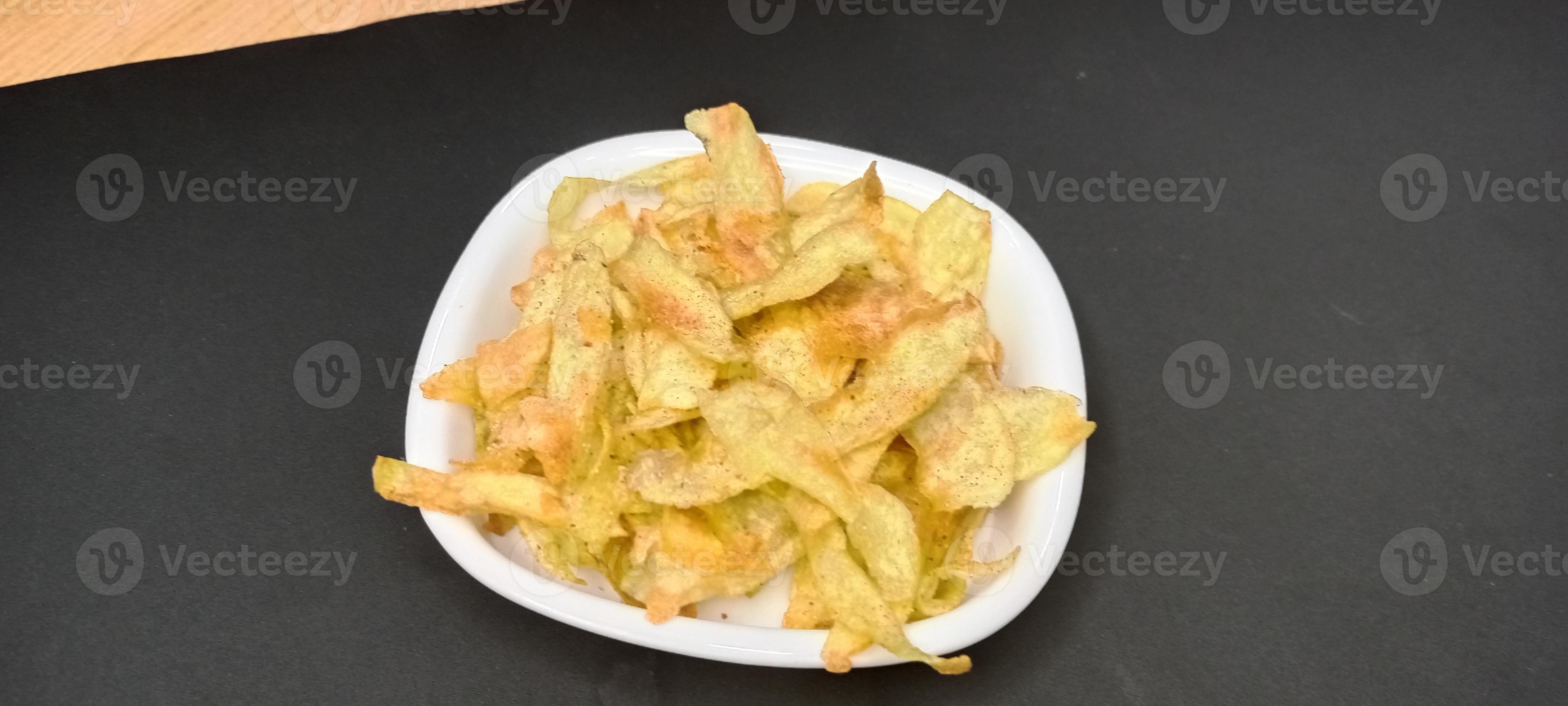 Potato Chips Called Aalu Chips in India, Chips Recipe 11834076 Stock Photo at Vecteezy