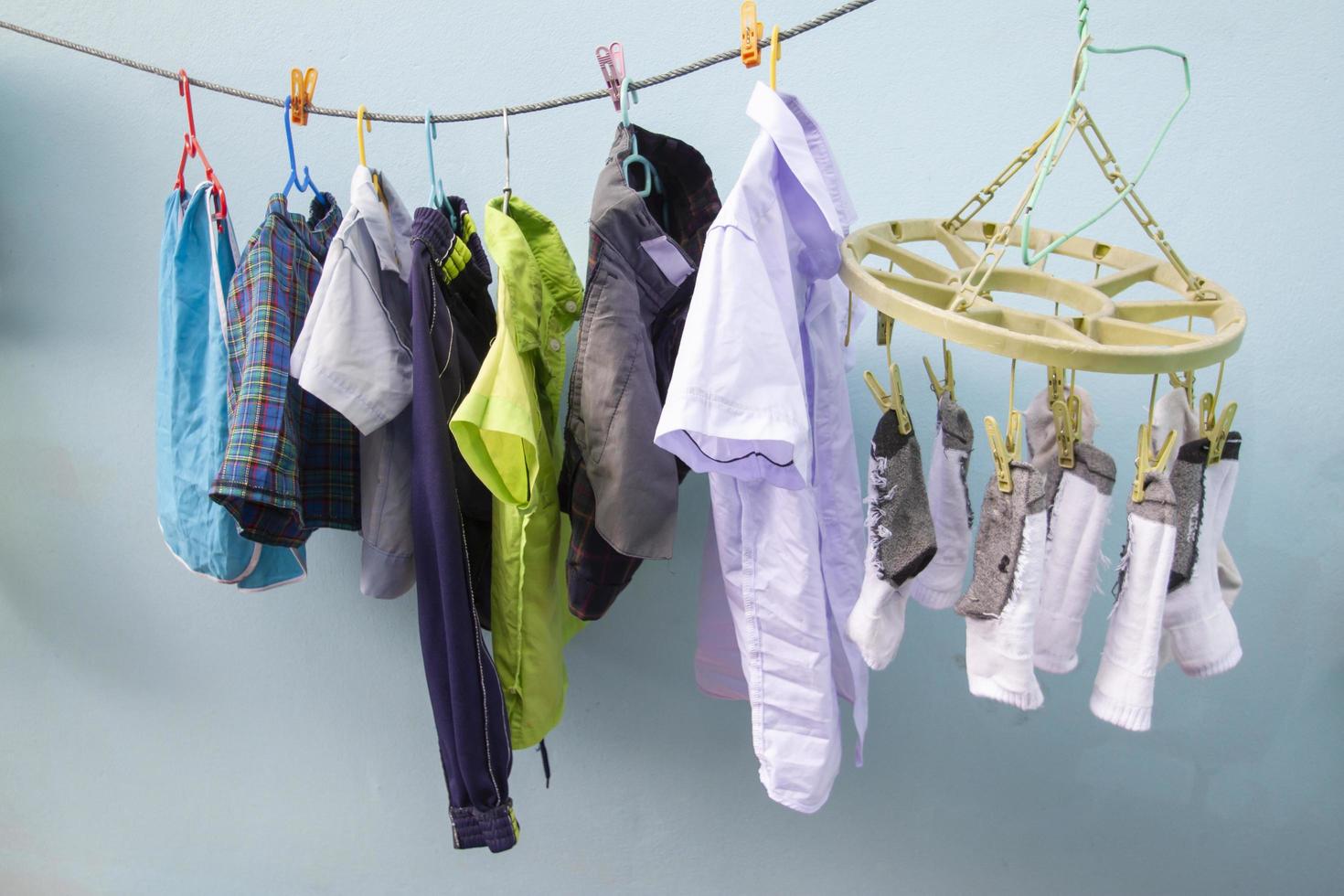The school is open during the rainy season. So must dry the clothes in