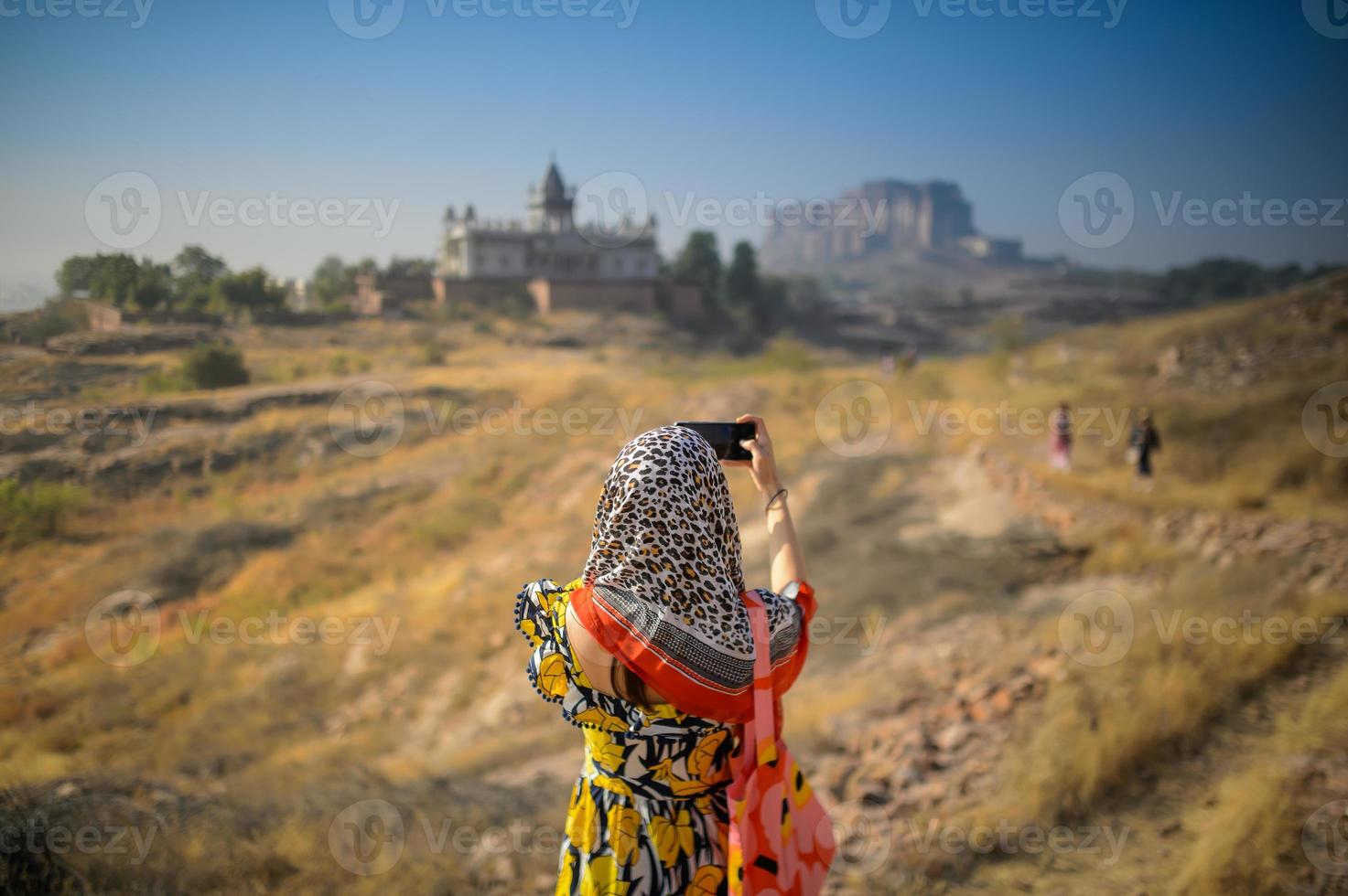 tourists taking pictures photo