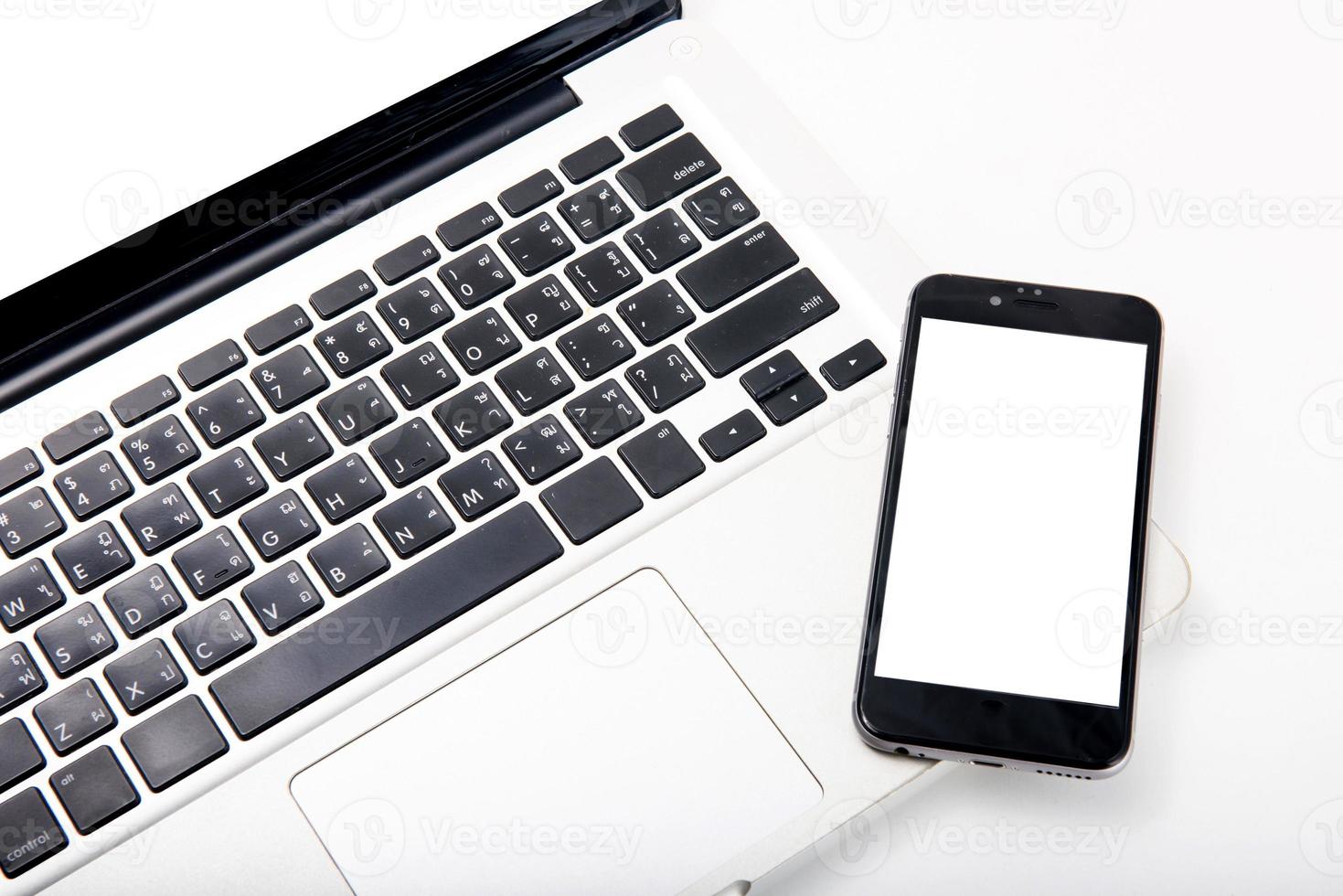 Closeup picture of a keyboard with a phone photo