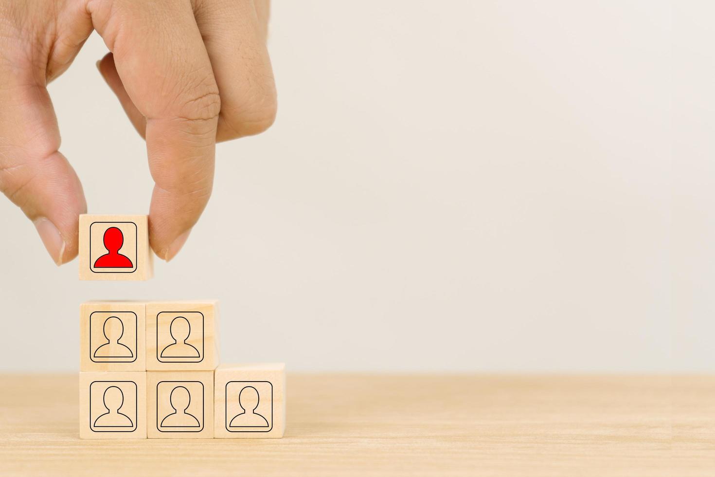 Business hand arranging wood cube stacking as step stair. Business concept growth success process on white background, copy space. photo