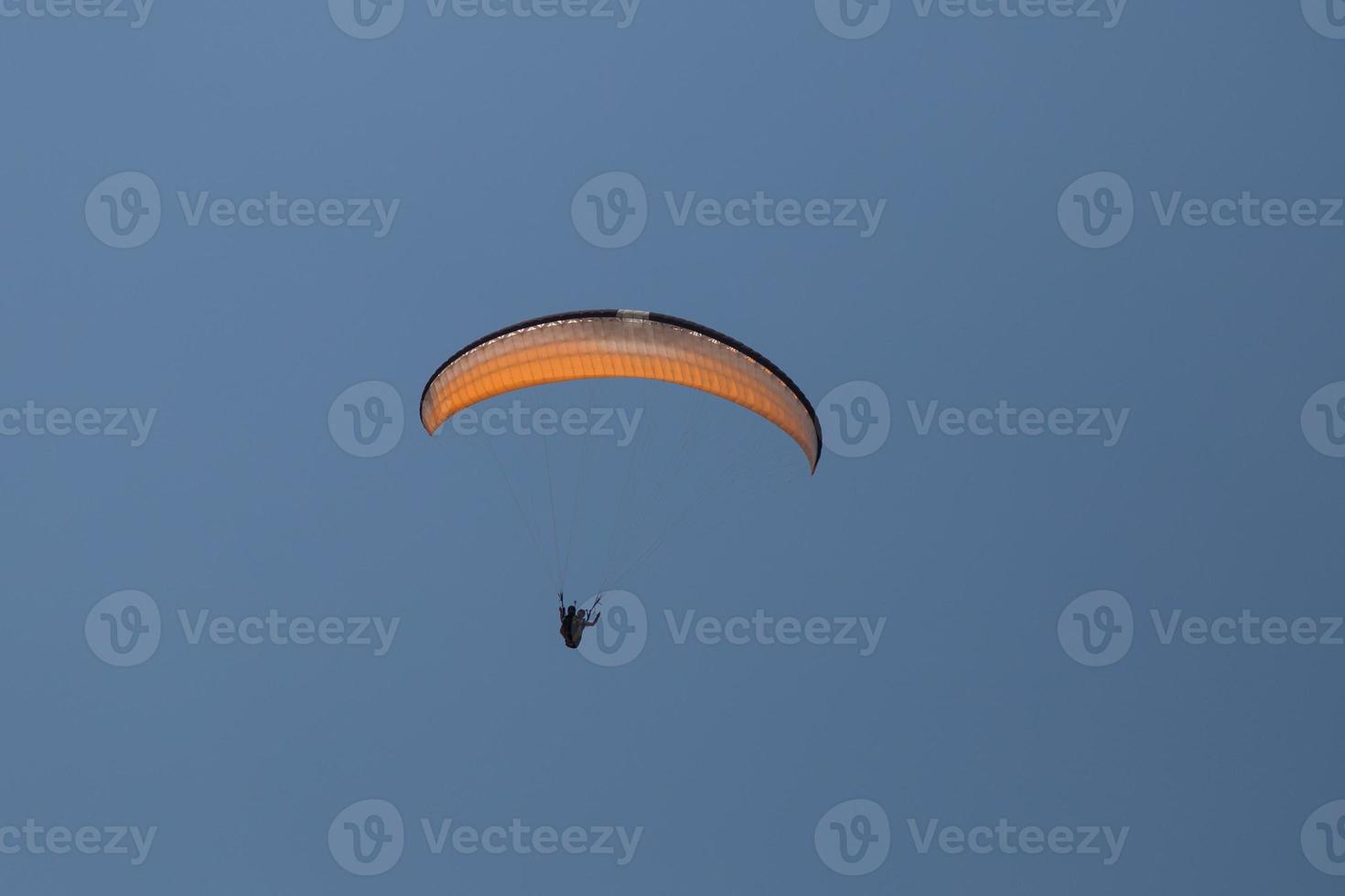 Tandem Paragliding is flying photo
