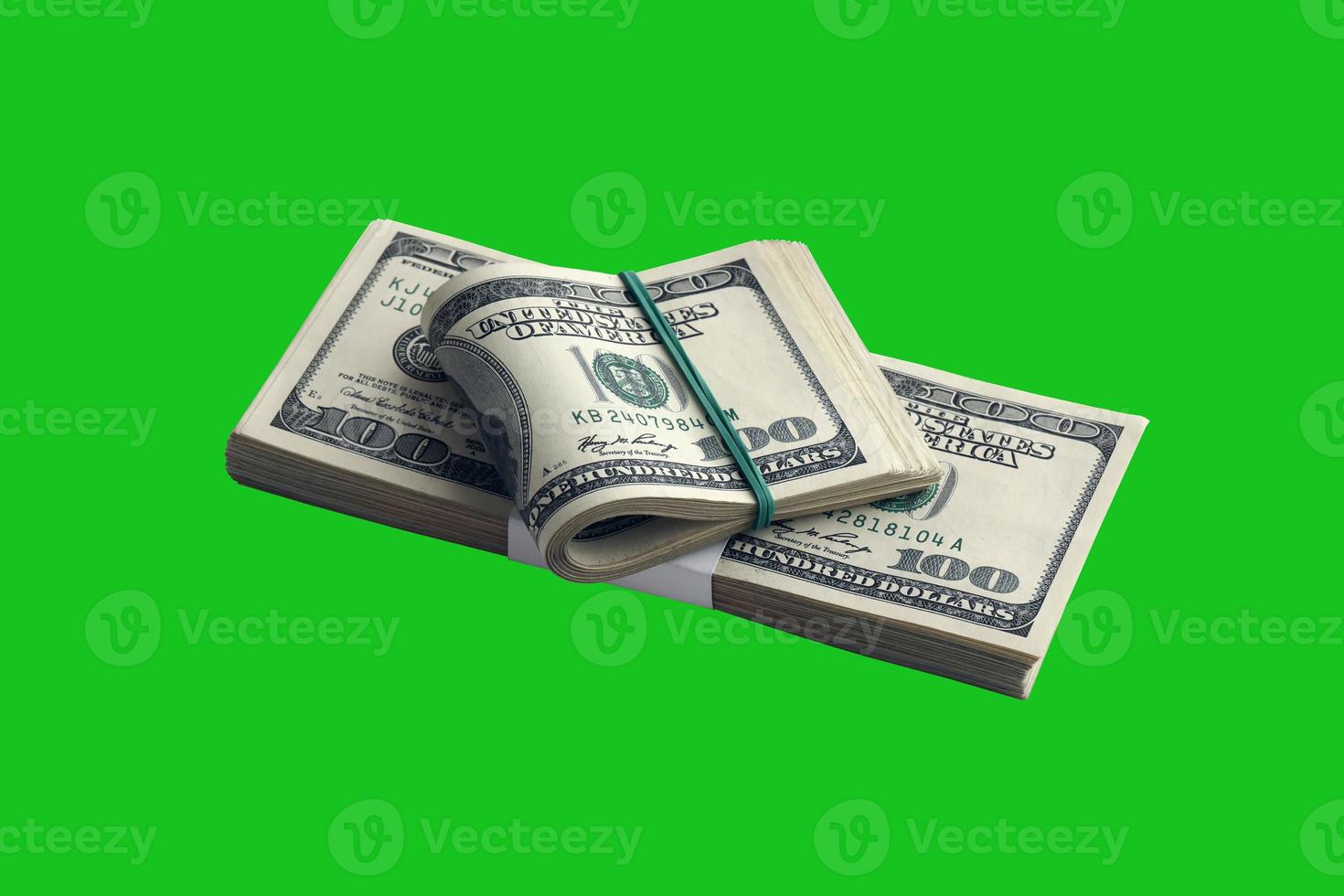 Bundle of US dollar bills isolated on chroma keyer green. Pack of american money with high resolution on perfect green mask photo