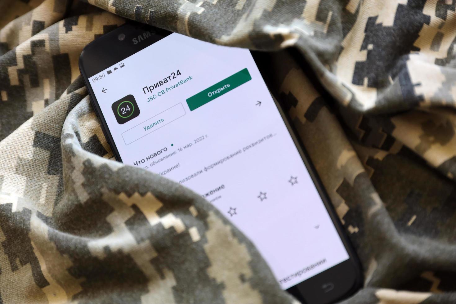TERNOPIL, UKRAINE - APRIL 24, 2022 Privatbank banking app on smartphone screen. Privatbank is important commercial bank in Ukraine photo