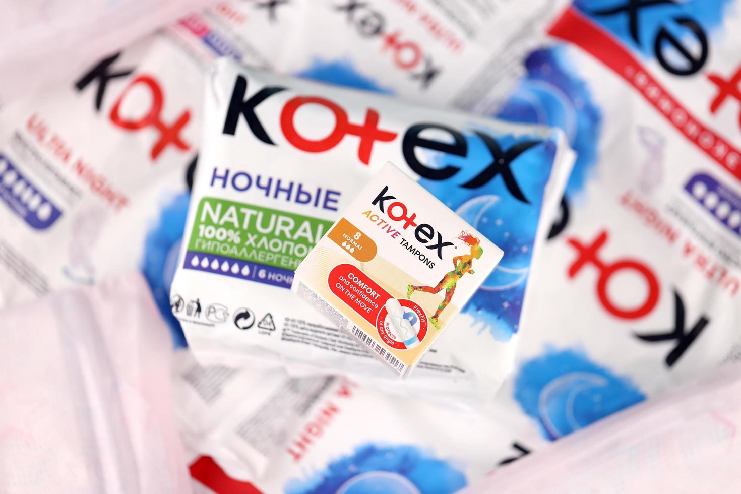 KHARKIV, UKRAINE - DECEMBER 16, 2021 Kotex production with logo. Kotex is a brand of feminine hygiene products, includes maxi, thin and ultra thin pads. photo