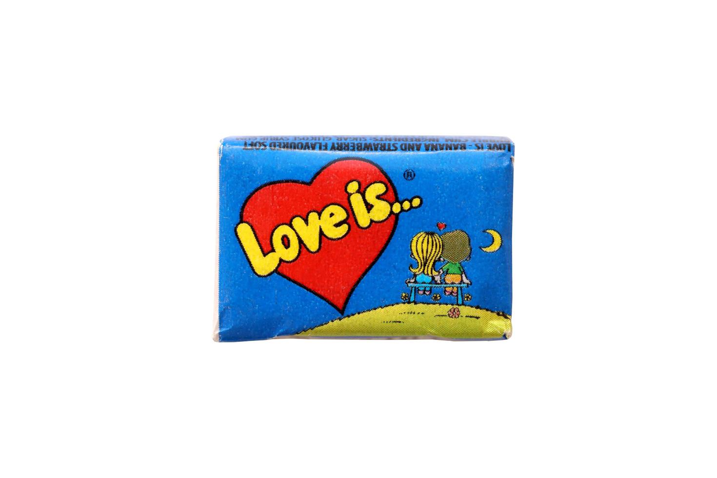 TERNOPIL, UKRAINE - JUNE 23, 2022 Love is - turkish bubble gums from 1990s popular in russian region. Various flavors of Love is chewing gum with liners about love photo