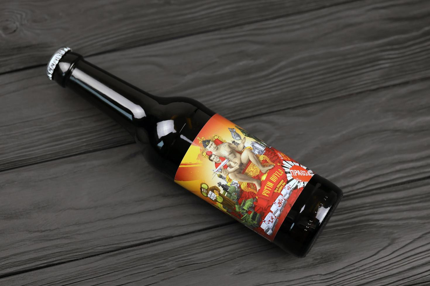 KHARKIV, UKRAINE - NOVEMBER 3, 2021 A bottle of beer featuring Russian President Vladimir Putin is called Putin Huilo literally Dickhead Putin brewed in Pravda Beer Theater in Lviv photo