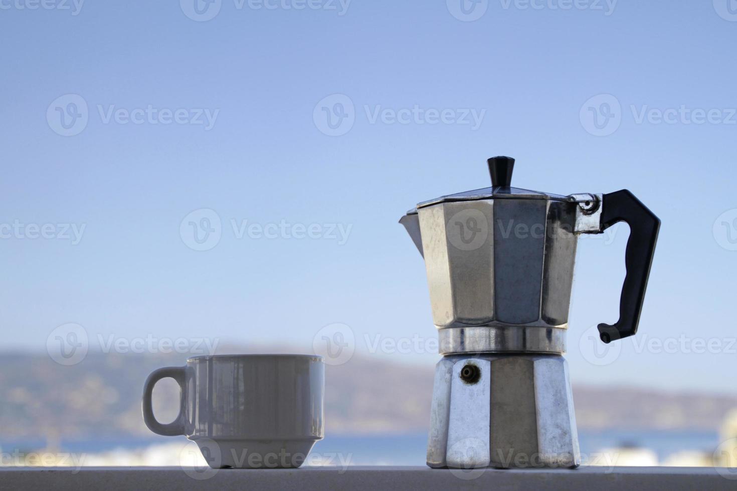 Morning coffee with the blue sky in Heraklion, Crete, in the background photo