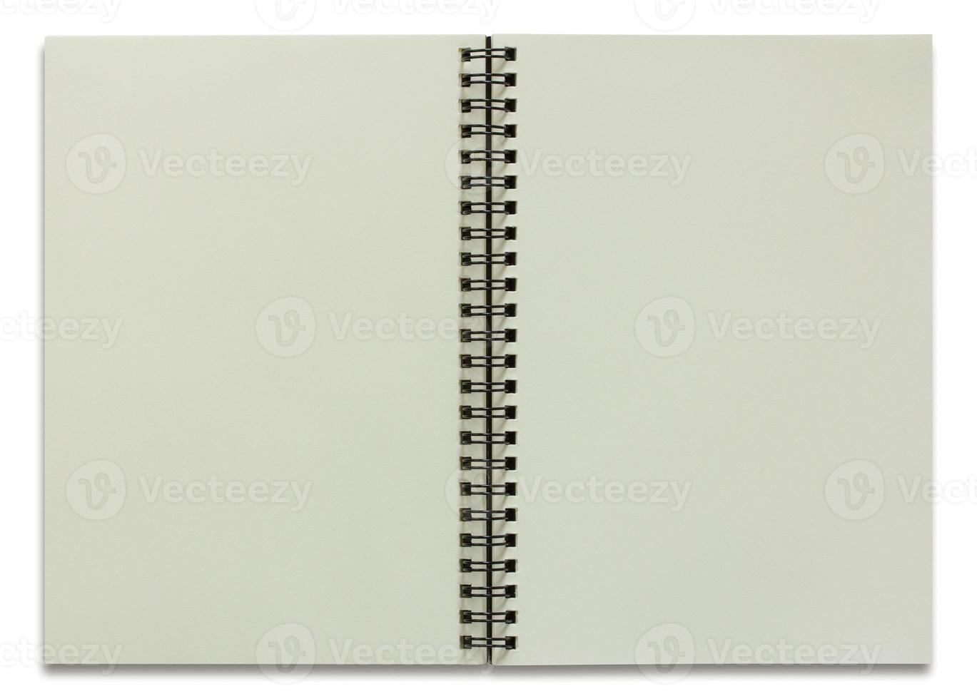 cuaderno espiral abierto aislado en blanco foto