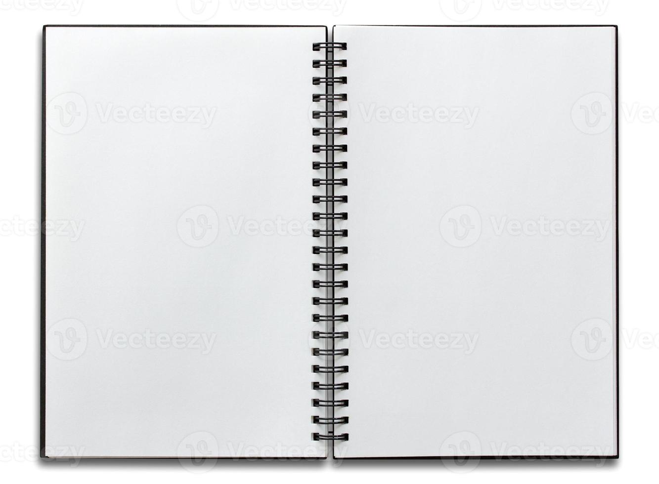 open spiral notebook isolated on white photo