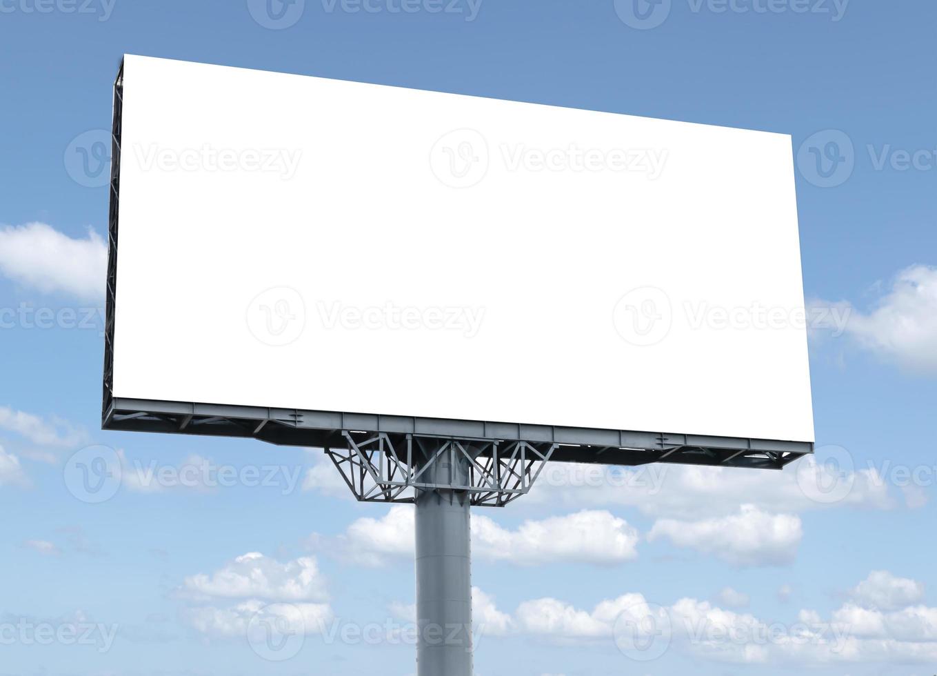 Outdoor pole billboard with mock up white screen on blue sky background with clipping path photo