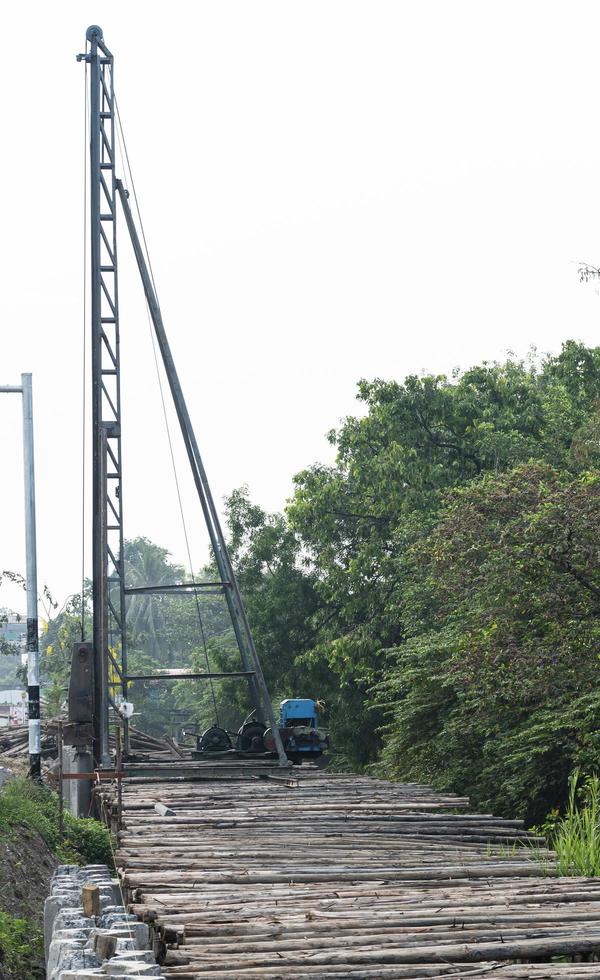 Derrick at road construction site photo