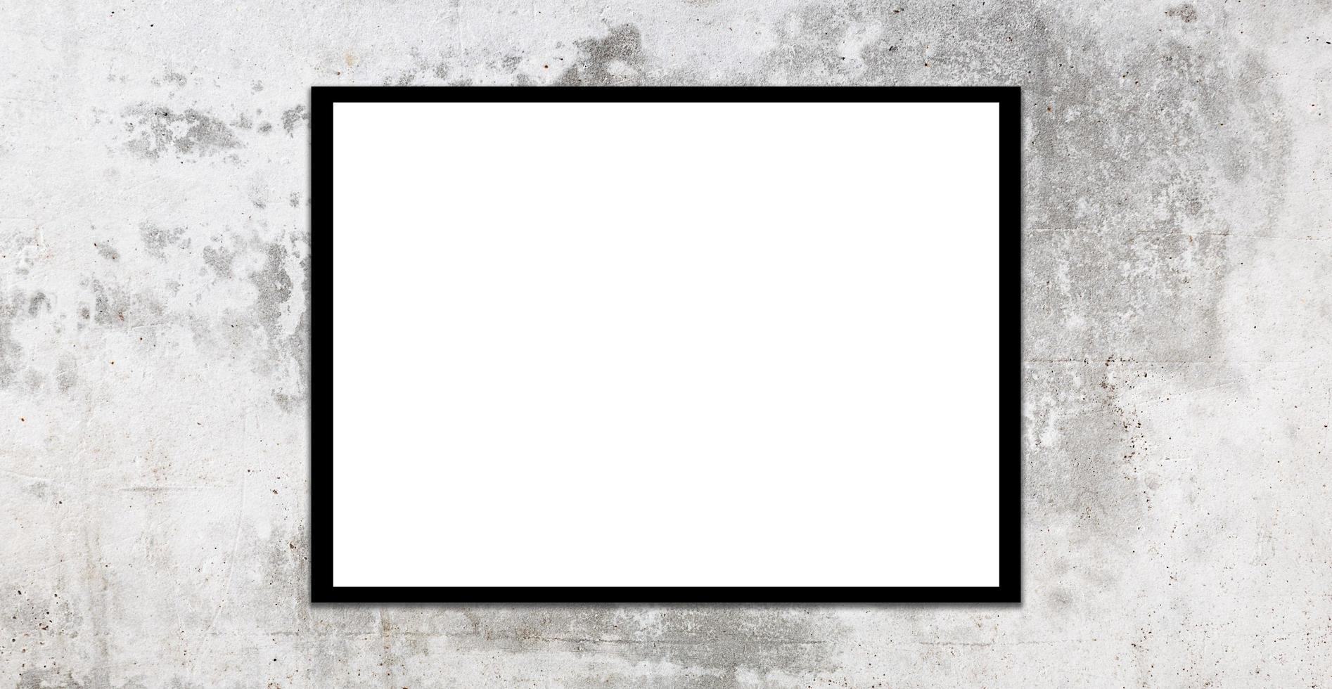 Mockup white picture frame on gray loft wall background with clipping path photo