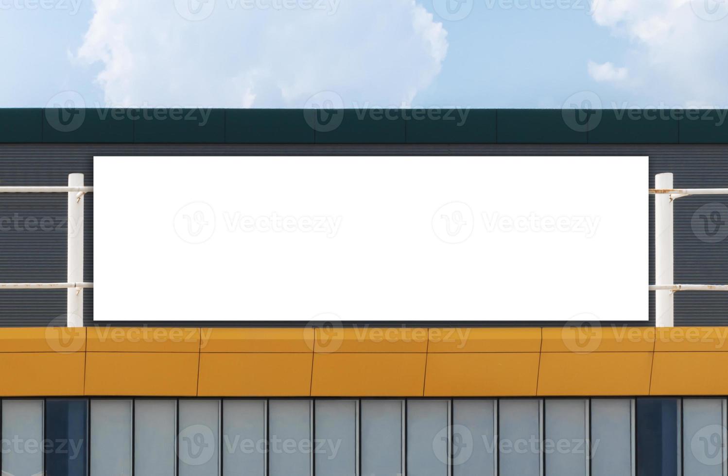 Mock up billboard on building on white background with clipping path photo