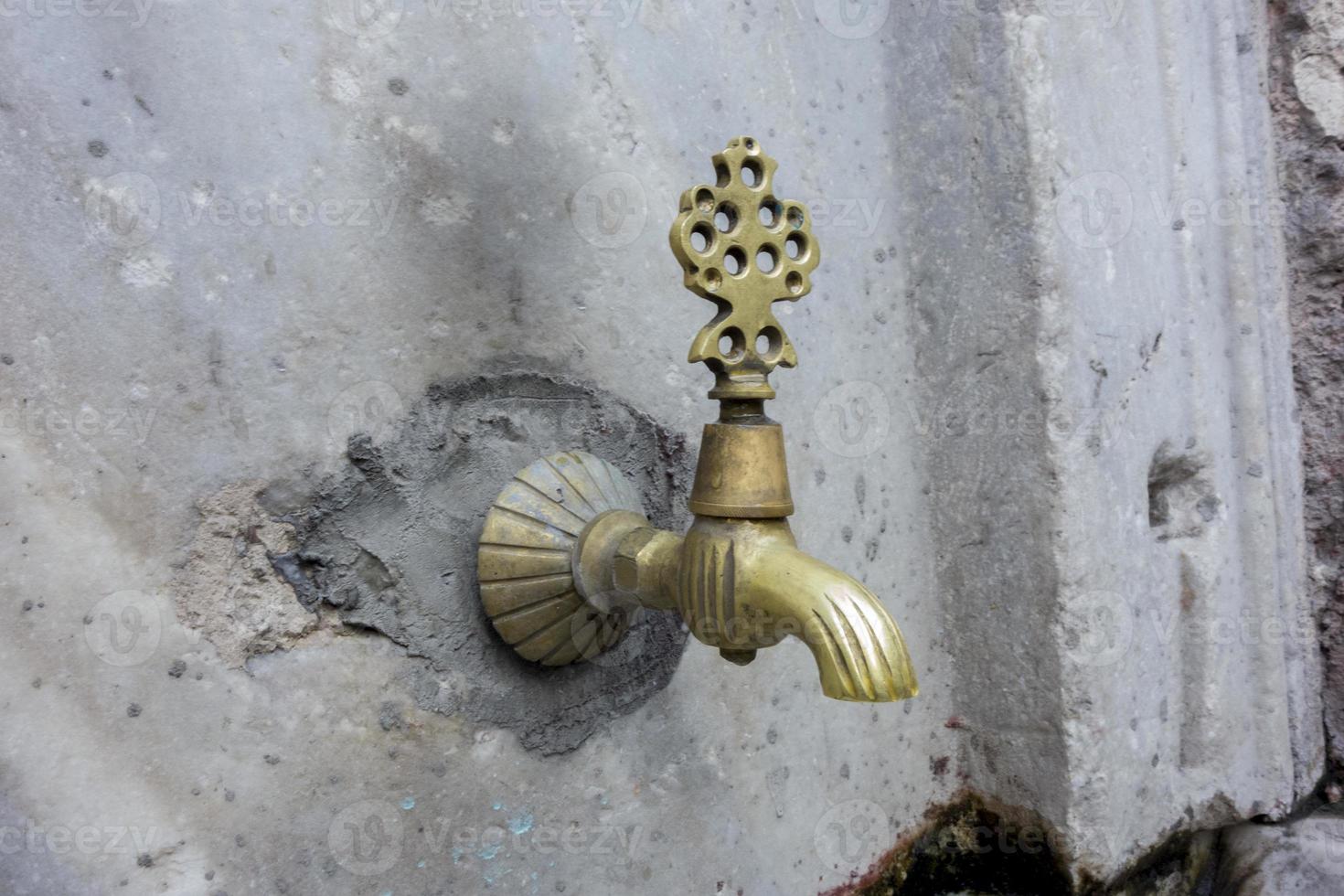 Old historic stone fountain in Turkey photo
