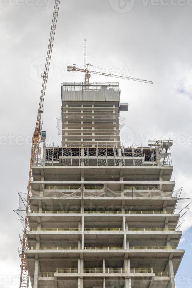 blue sky and yellow construction equipment photo