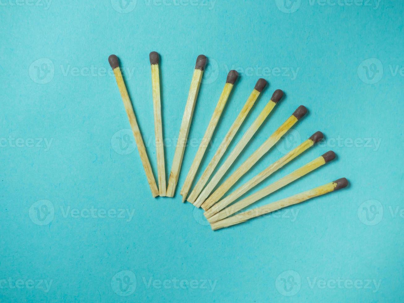 Matches on a blue background. Fire-starting products photo