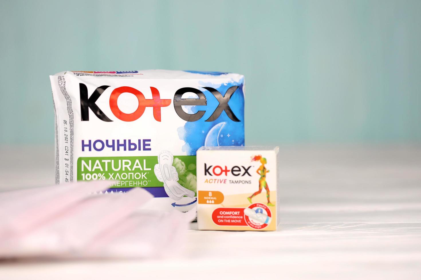 KHARKIV, UKRAINE - DECEMBER 16, 2021 Kotex production with logo. Kotex is a brand of feminine hygiene products, includes maxi, thin and ultra thin pads. photo
