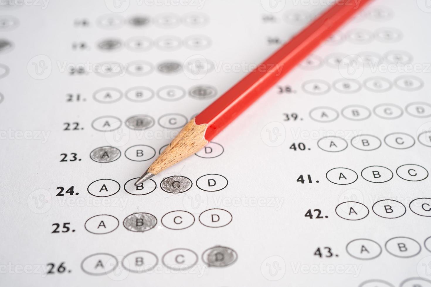 Answer sheets with pencil drawing fill to select choice, education concept. photo