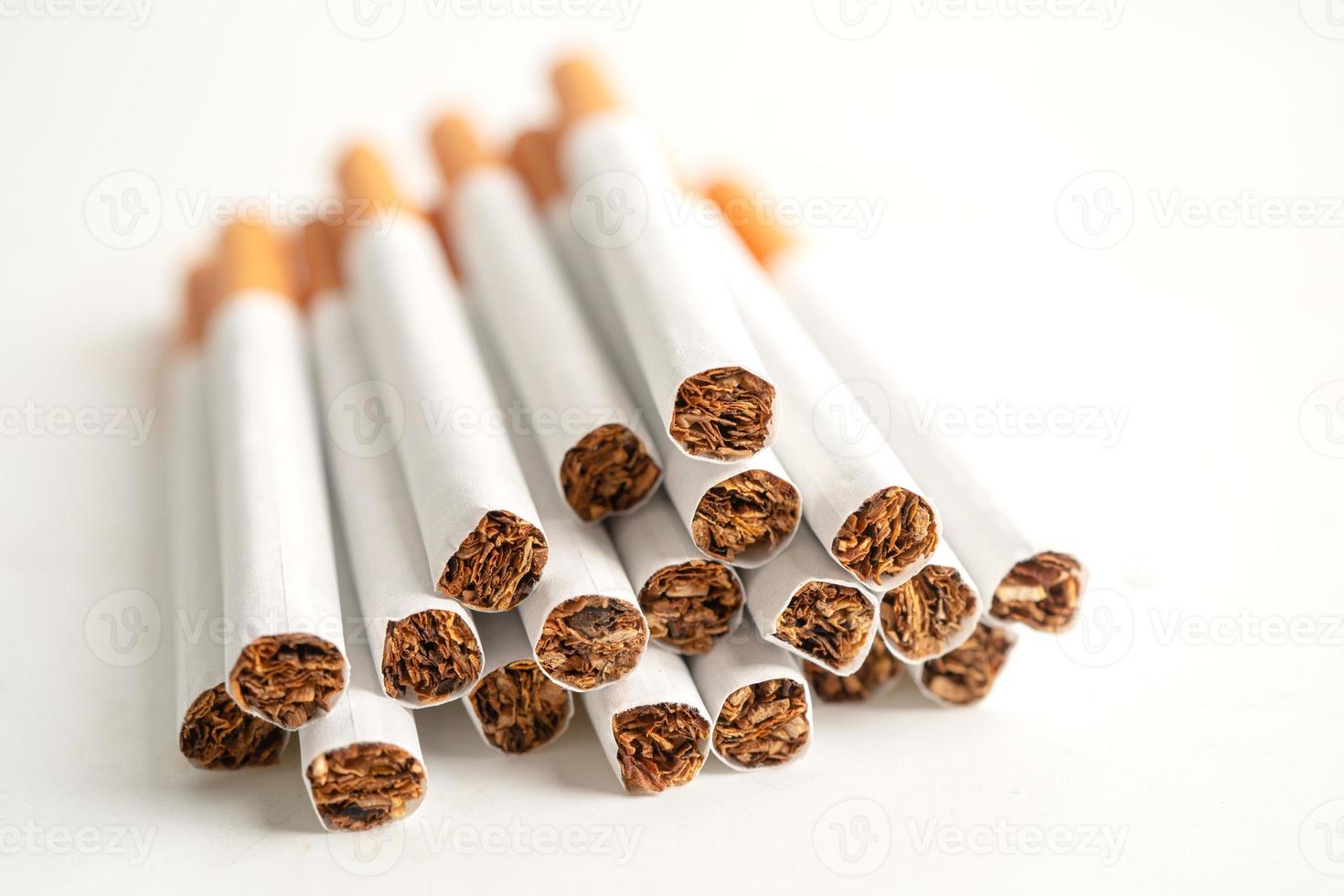 Cigarette, tobacco in roll paper with filter tube isolated on white background, No smoking concept. photo