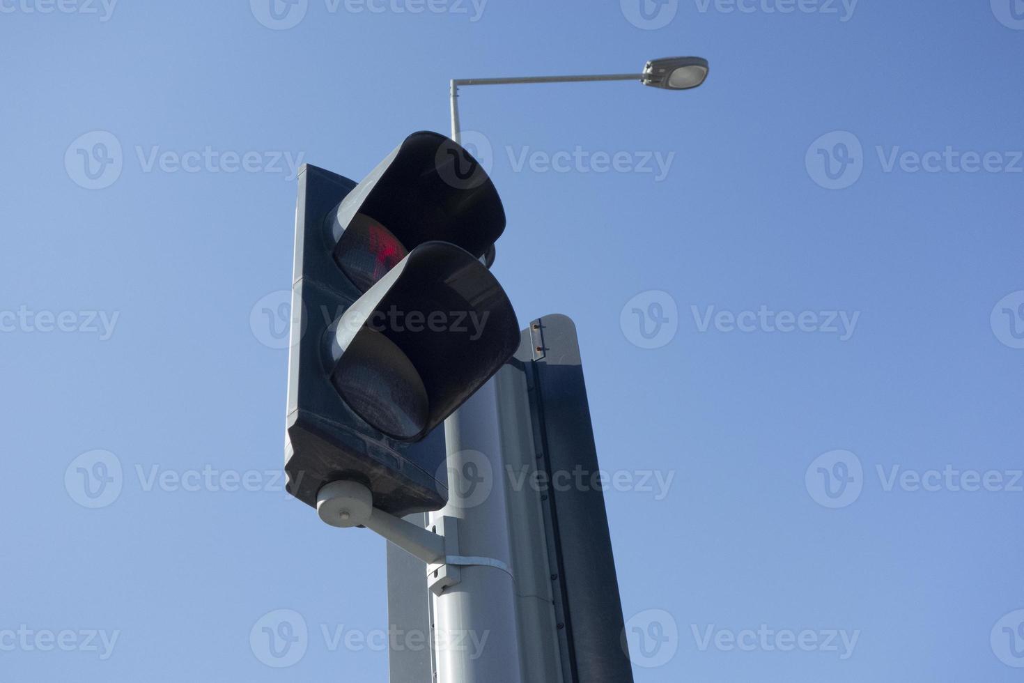 blue sky red traffic light photo