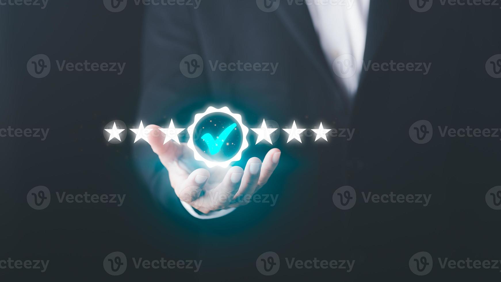 Business people hold and display the best quality assurance for product warranty, standard quality concept, business assurance, industry certification, product certification management. photo