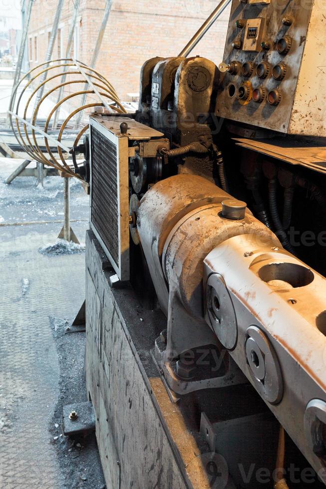 steel cutting and bender machine close up photo