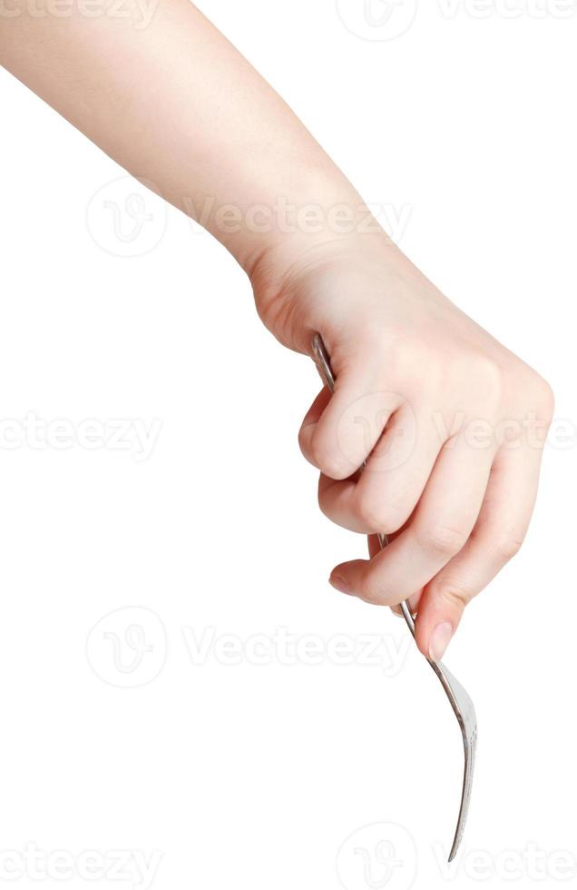 hand with fork isolated on white photo