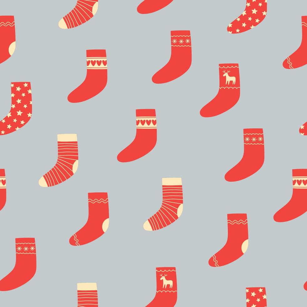 Seamless pattern of red Christmas socks on grey background. Doodle style. Christmas winter background. vector