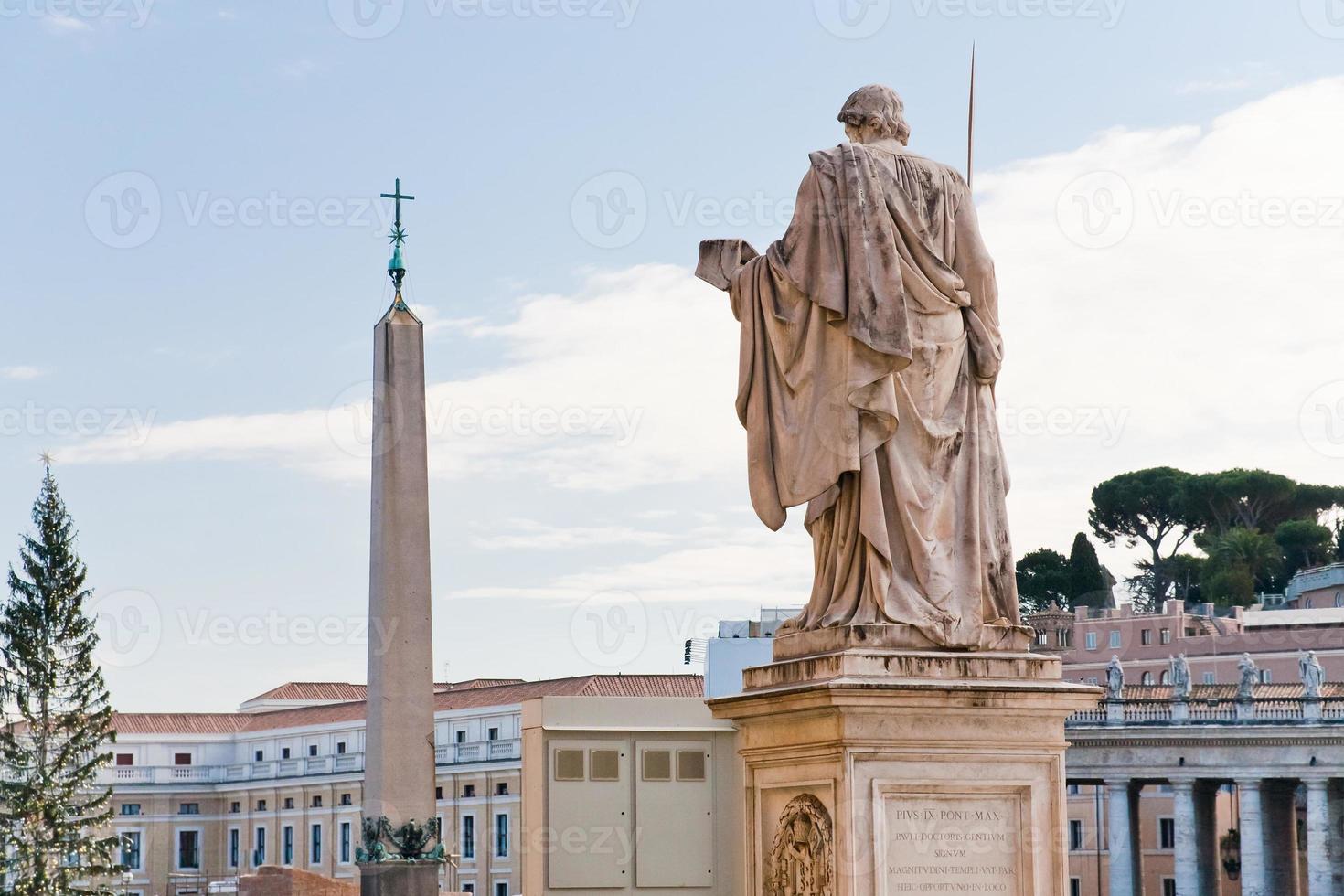 view Egyptian obelisk on St.Peter Square from Piazza Pio, Vatican, Italy photo