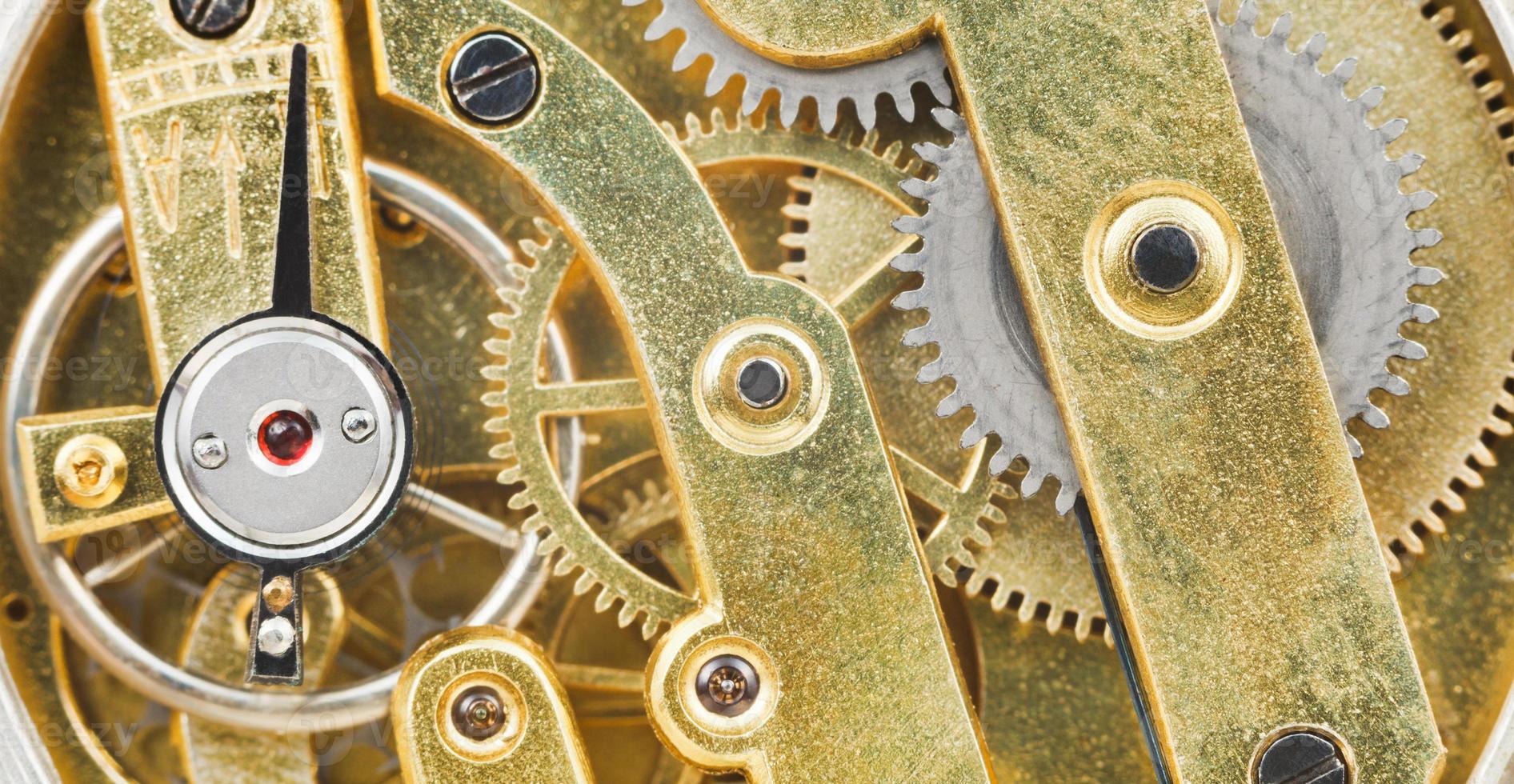background from brass mechanical clockwork photo