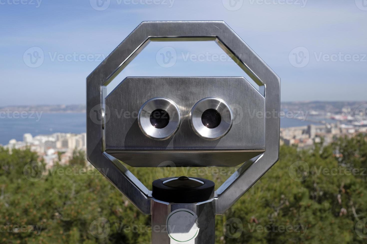 Viewpoint on a hill in Marseille, France, with mounted binoculars photo