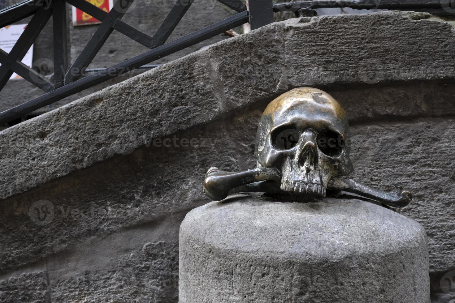 Bronze skull in front of Purgatorio Ad Arco In Naples photo