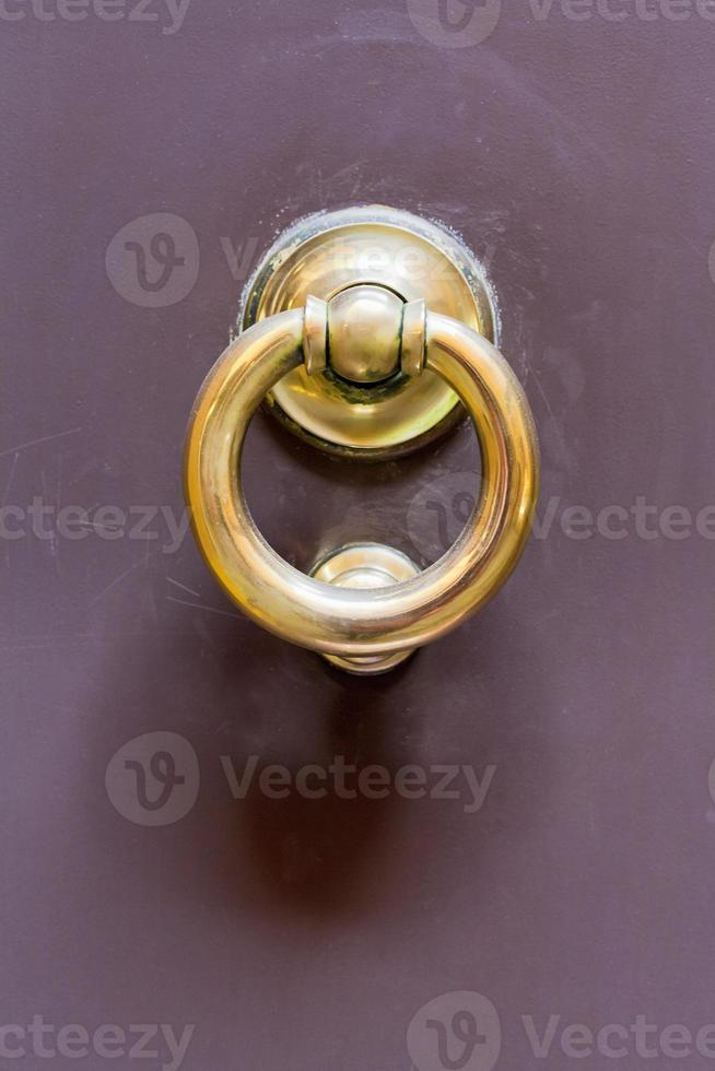 old brass ring door handle photo