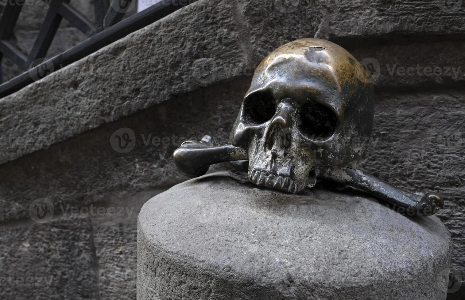 Bronze skull in front of Purgatorio Ad Arco In Naples photo