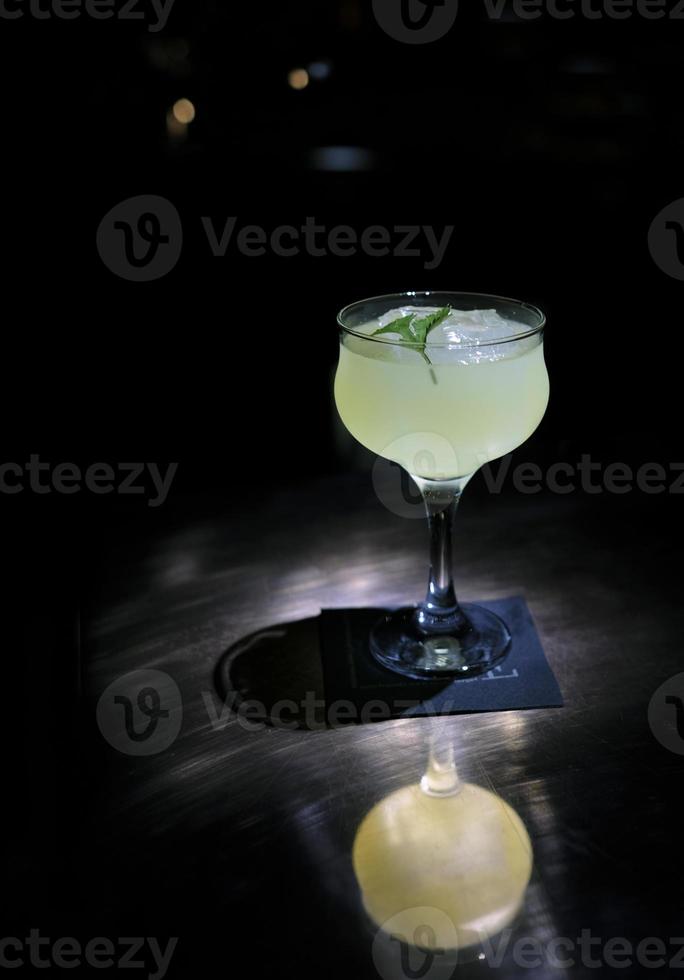 Beautiful cocktail in a glass with a blurred background photo