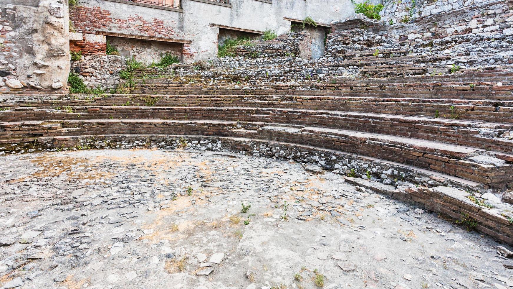 ruins of ancient roman Odeon theater in Taormina photo