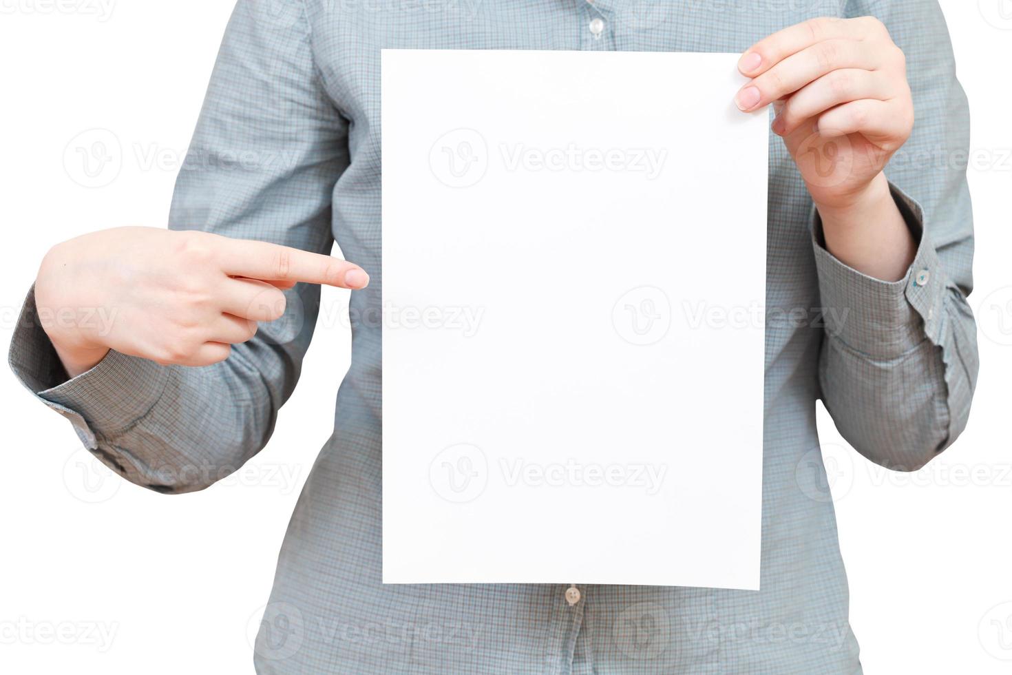 finger points on blank sheet of paper photo
