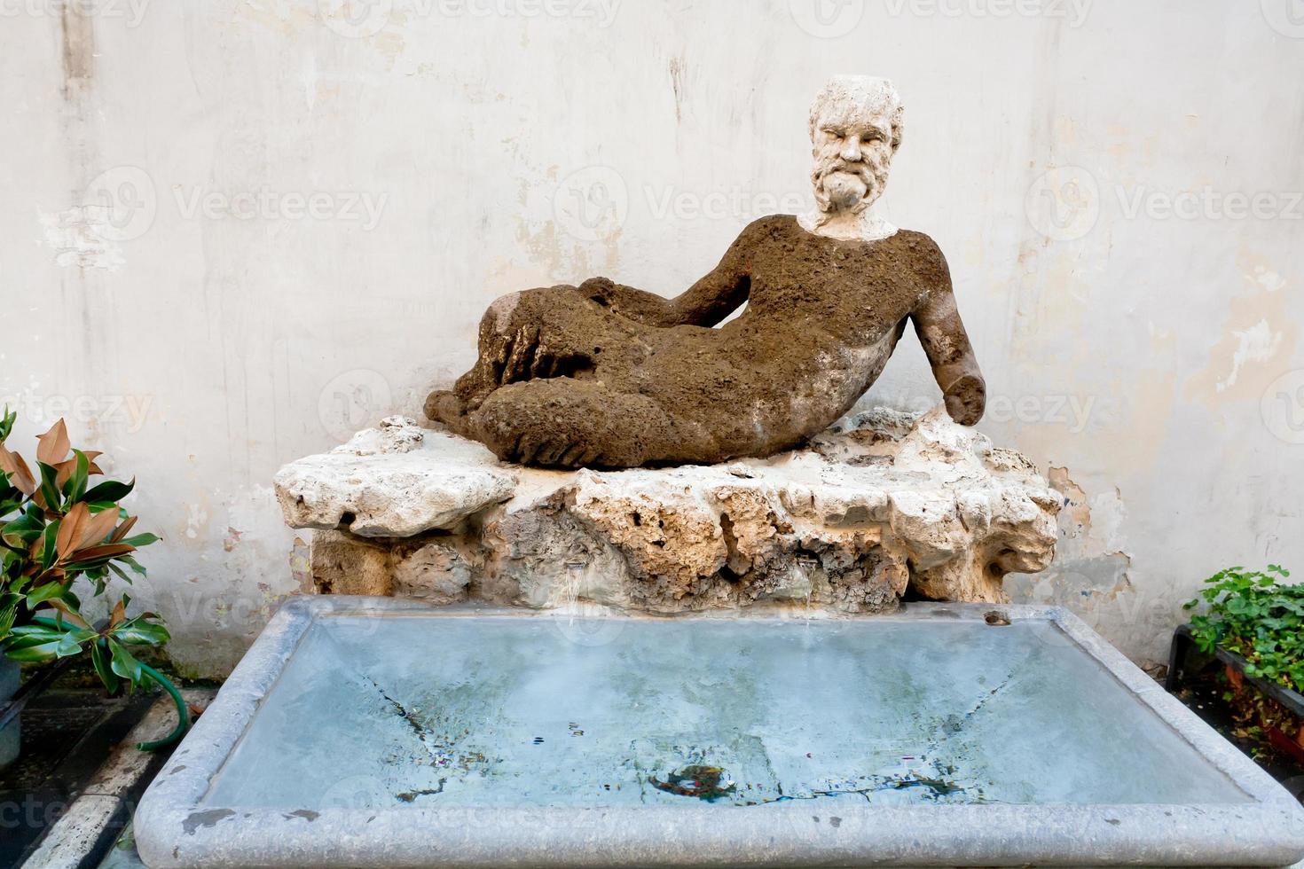 antique Silenus statue on via del Babuino, Rome photo