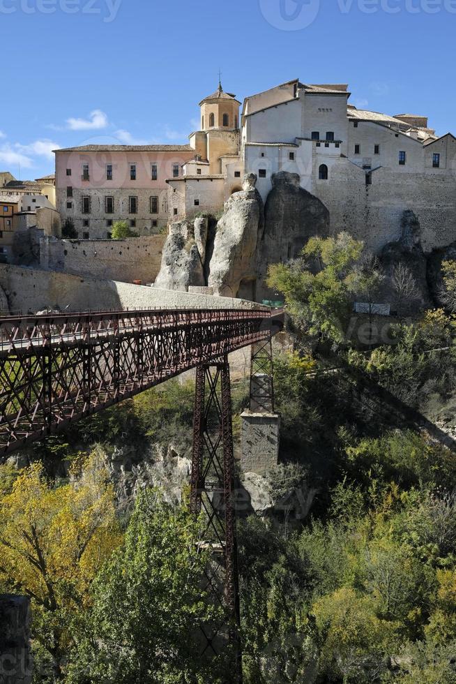 Beautiful buildings in Cuenca, Spain, during autumn season photo