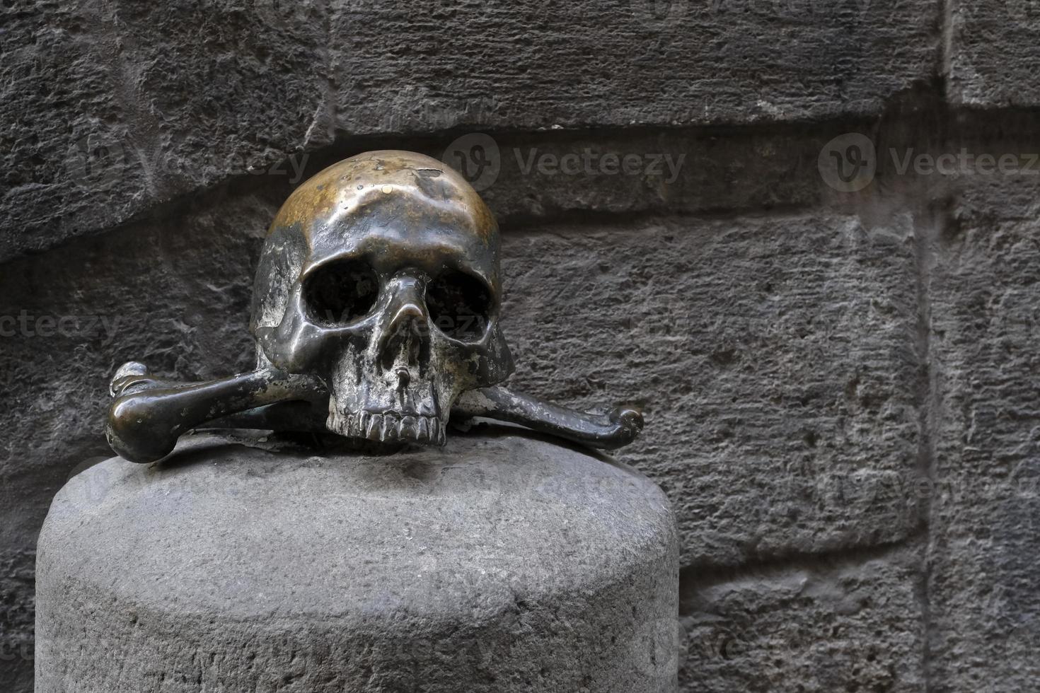Bronze skull in front of Purgatorio Ad Arco In Naples photo