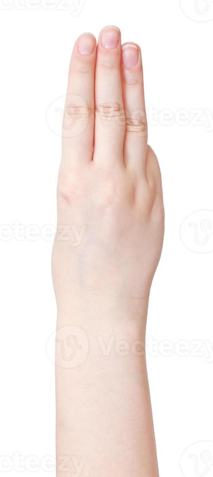 three fingers counting - hand gesture photo
