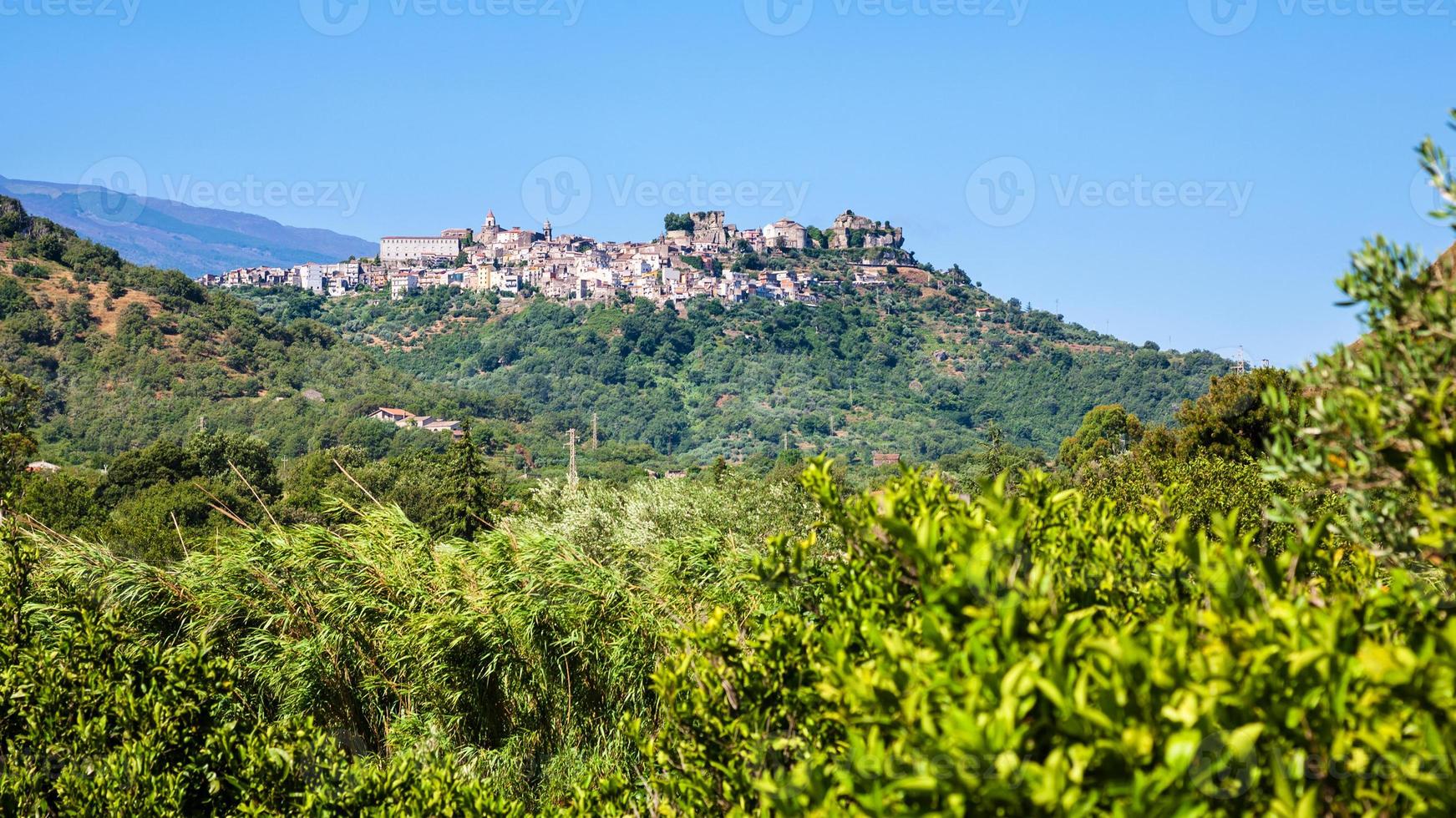 view of Castiglione di Sicilia town on hill photo