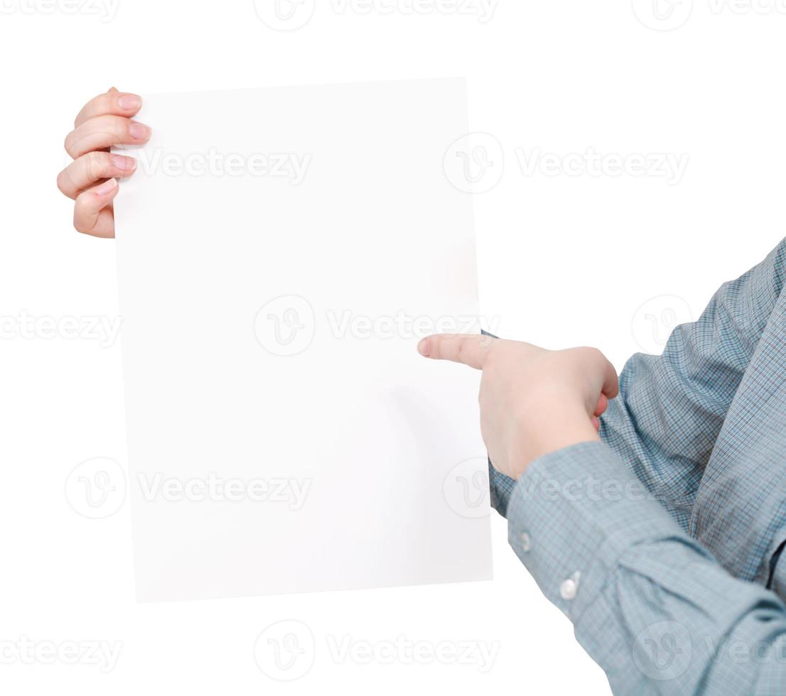 finger pointing on sheet of paper photo