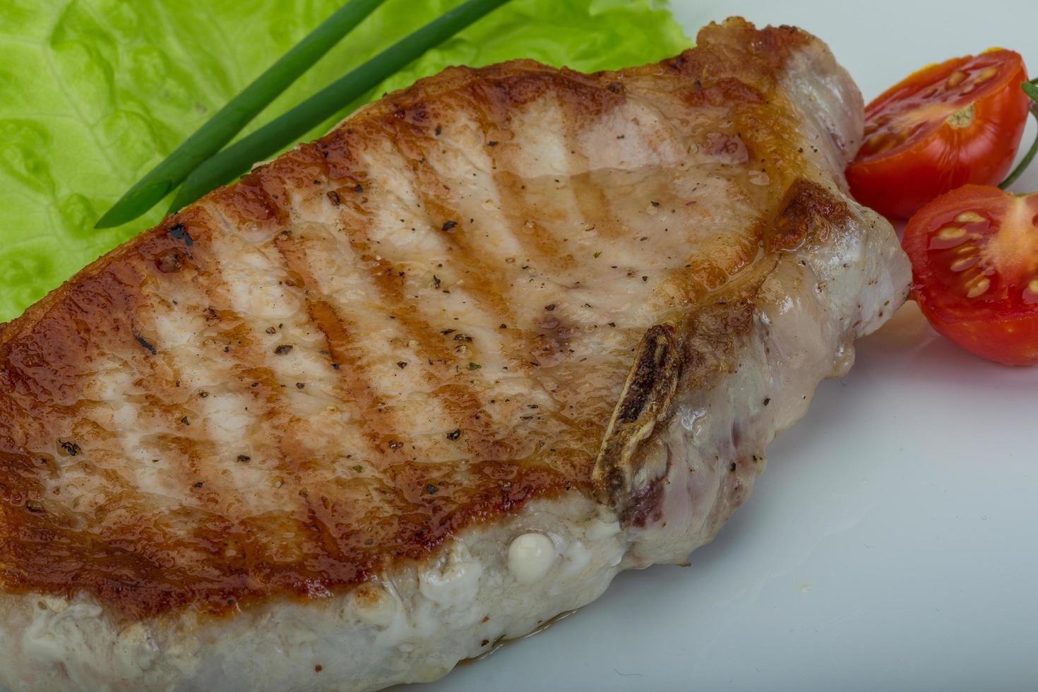 Grilled pork steak photo
